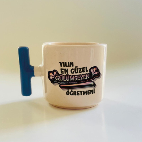 Yılın En Güzel Gülümseyen Öğretmeni Baskılı Mavi Kulplu T Öğretmenler Günü Kupa