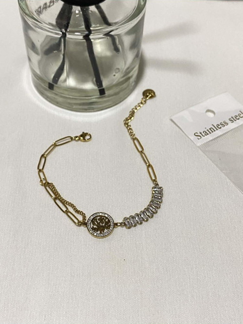 Kadın çelik oval zincirde baget taşlı ve yaşam çiçeği bileklik