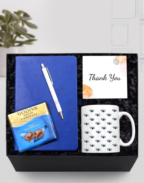 Mavi Defter & Nazar Boncuklu Göz Kupa & Gümüş Renk Detaylı Beyaz Tükenmez Kalem & Godiva Hediye Seti